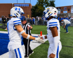 Highlands football players celebrate a touchdown against Covington Catholic in the Blitz 5 Game of the Week.