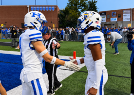 Highlands football players celebrate a touchdown against Covington Catholic in the Blitz 5 Game of the Week.